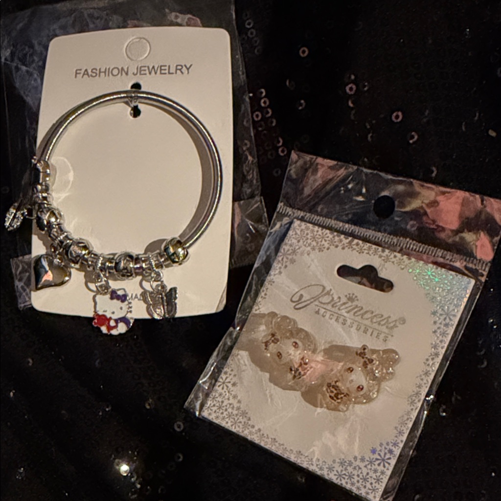 Silver Charm Bracelet And Earrings